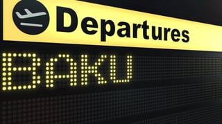 flight to baku on international airport departures board travelling to azerbaijan conceptual flight to baku on international airport departures board travelling to azerbaijan conceptual